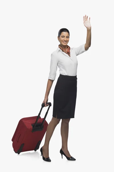 Air hostess carrying her luggage — Stock Photo, Image