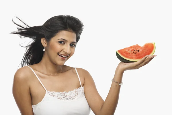Woman holding a slice of watermelon — Stock Photo, Image