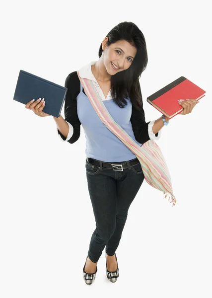 Student holding books — Stock Photo, Image