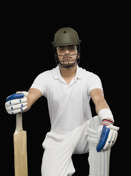 Cricket batsman met een cricket bat — Stockfoto