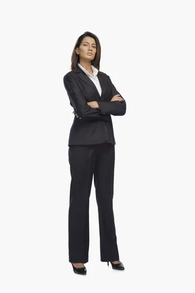 Businesswoman with her arms crossed — Stock Photo, Image