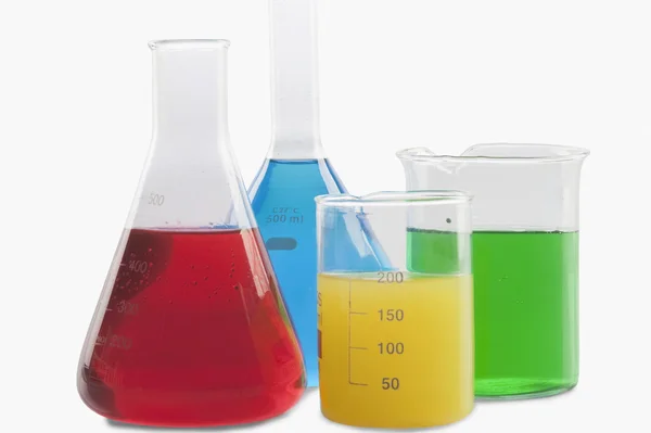 Laboratory glassware with chemicals — Stock Photo, Image