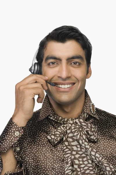 Customer wearing a headset — Stock Photo, Image