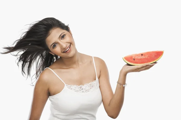 Woman holding slice of watermelon — Stock Photo, Image