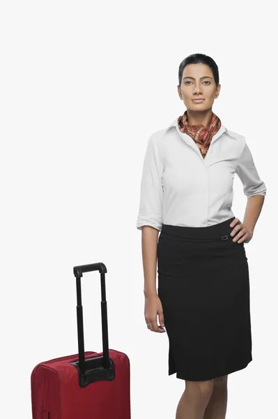 Air hostess with her luggage — Stock Photo, Image