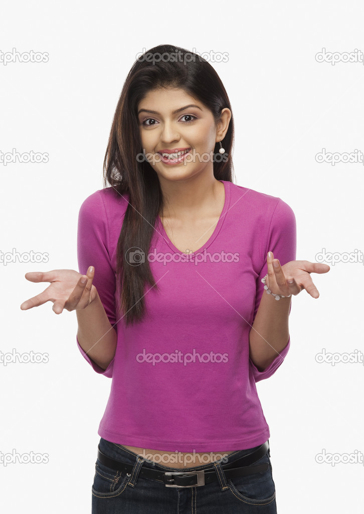 Woman shrugging and smiling