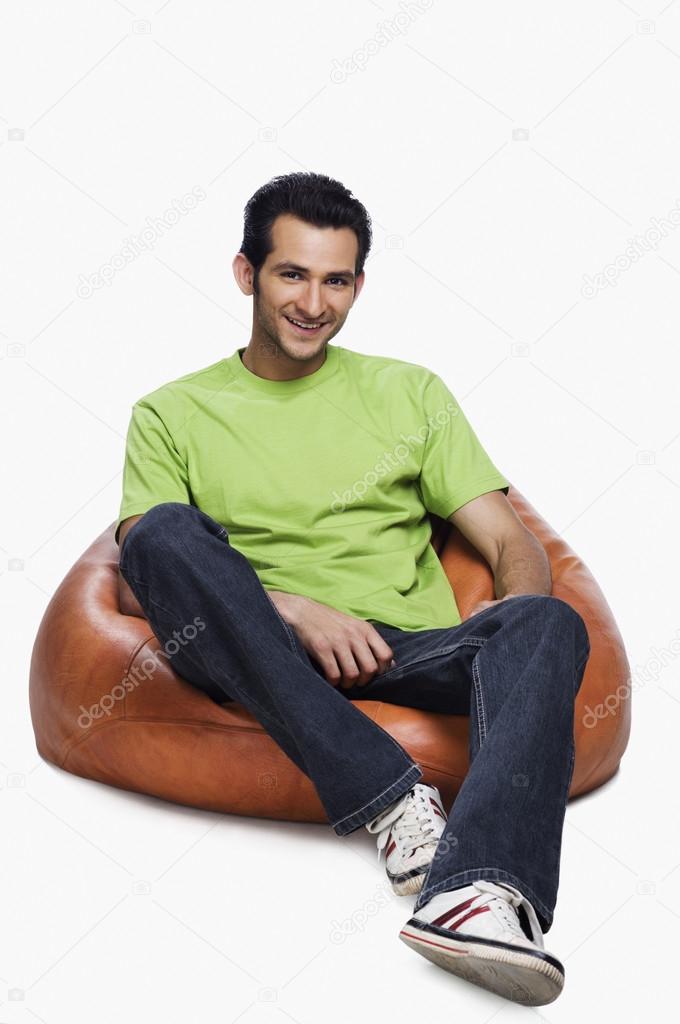 Man sitting on a bean bag