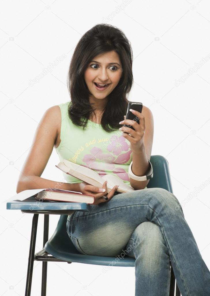 Student looking at a mobile phone