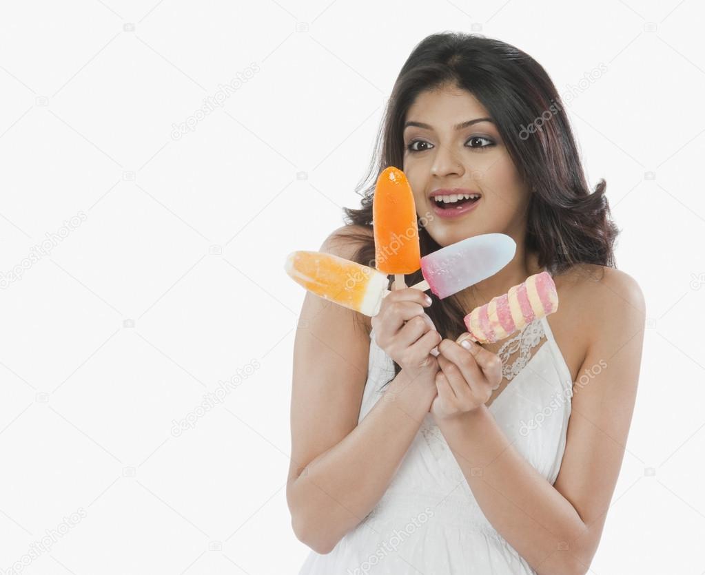 Woman holding ice creams