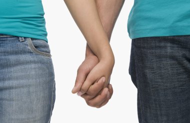 Couple holding hands clipart