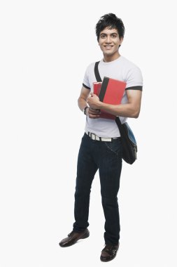 Üniversite öğrencisi holding notebooklar