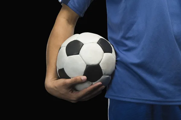 Jugador de fútbol con una pelota de fútbol — Foto de Stock