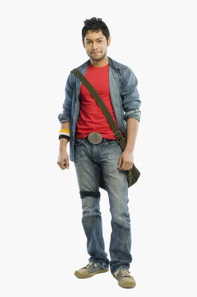 Student posing with a shoulder bag — Stock Photo, Image
