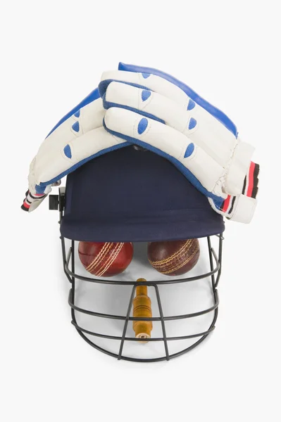 Cricket equipment forming a human face — Stock Photo, Image