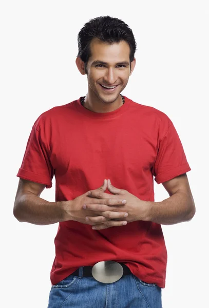 Man standing with his hands clasped — Stock Photo, Image