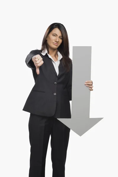 Businesswoman gesturing thumbs down sign — Stock Photo, Image