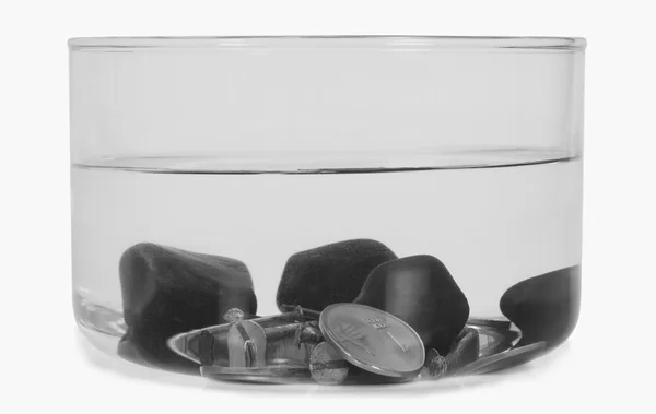 Stones sunk in a bowl of water — Stock Photo, Image