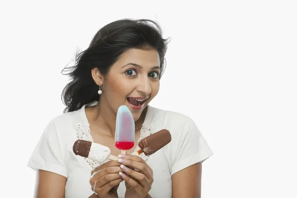 Woman holding ice creams — Stock Photo, Image