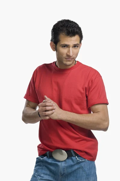 Man standing with his hands clasped — Stock Photo, Image