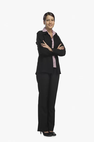 Businesswoman with her arms crossed — Stock Photo, Image