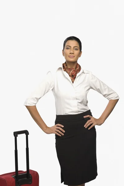 Air hostess with her luggage — Stock Photo, Image