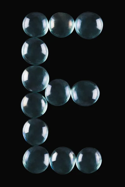 Bolas de mármore em forma de letra E — Fotografia de Stock
