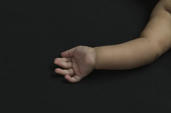Baby 's hand — стоковое фото