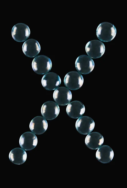 大理石球形状的字母 x — 图库照片