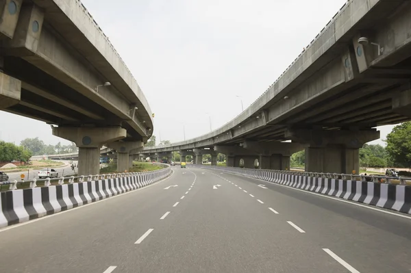 Road in the middle of overpasses — Stock Photo, Image