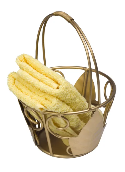 Yellow towels in a basket — Stock Photo, Image