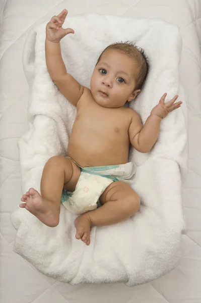 Baby boy lying on the bed — Stock Photo, Image