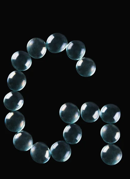 Marble balls in the shape of letter G — Stock Photo, Image
