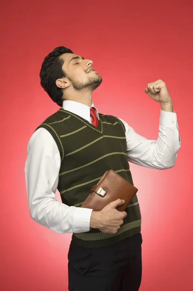 Businessman clenching his fist with excitement — Stock Photo, Image