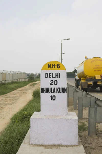 Milestone at the roadside — Stock Photo, Image