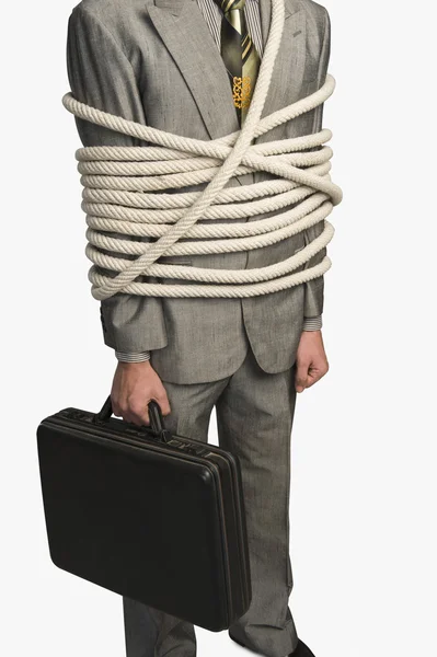 Homme d'affaires attaché avec des cordes — Photo