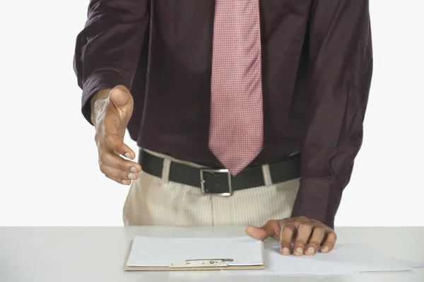 Businessman offering a handshake — Stock Photo, Image