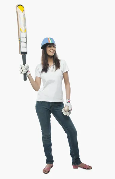 Female cricket fan holding a bat and a ball — Stock Photo, Image