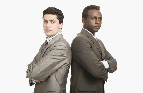 Dois homens de negócios de costas para trás — Fotografia de Stock