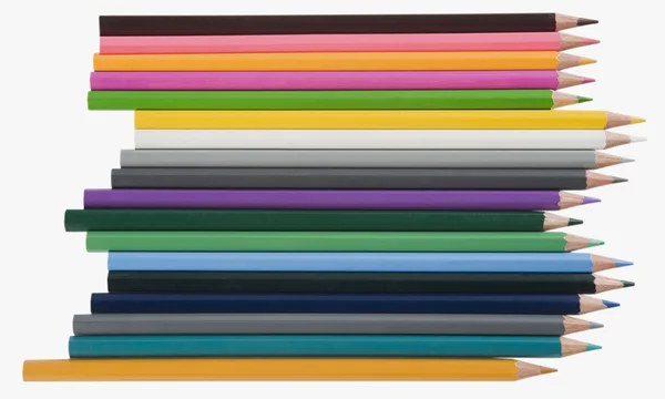 Colored pencils in a row — Stock Photo, Image