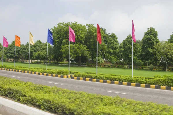 Flags at roadside, Shanti Path — Stock Photo, Image