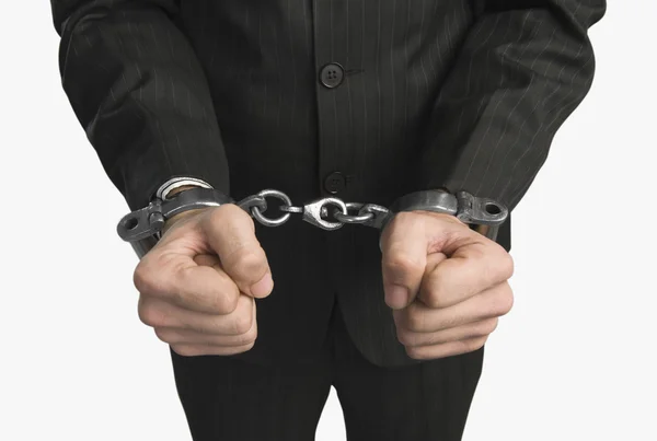 Businessman tied up with handcuffs — Stock Photo, Image