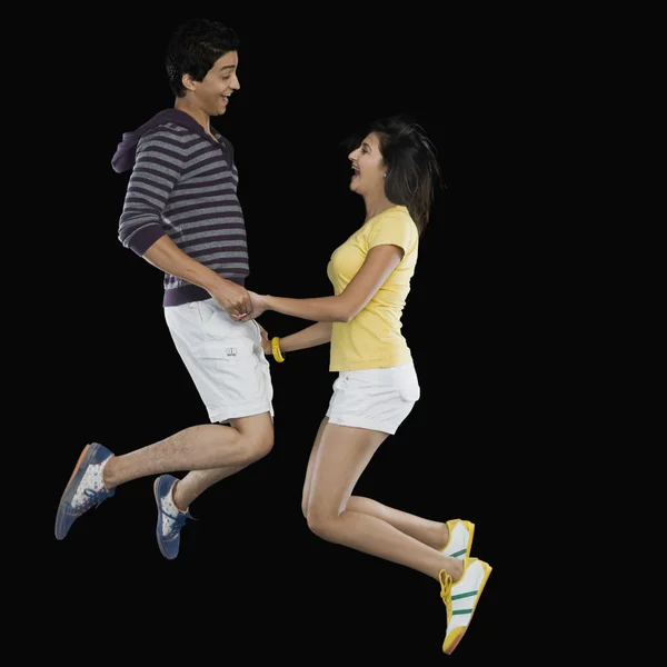 Couple jumping — Stock Photo, Image