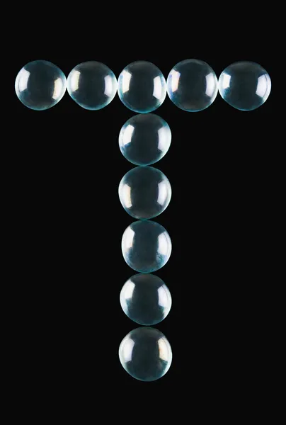 Bolas de mármol en forma de letra T — Foto de Stock