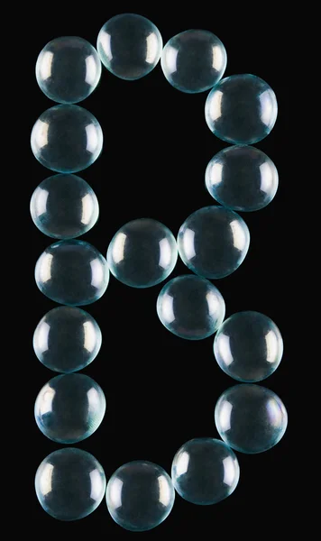Marmeren ballen gerangschikt in de vorm van de letter b — Stockfoto