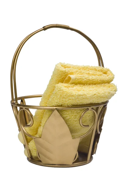Yellow towels in a basket — Stock Photo, Image