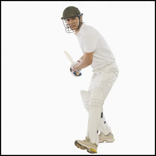 Cricket batsman with a high back lift — Stock Photo, Image