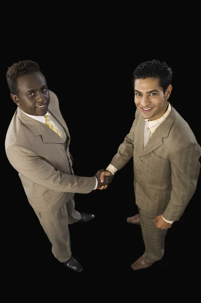 Two businessmen shaking hands — Stock Photo, Image