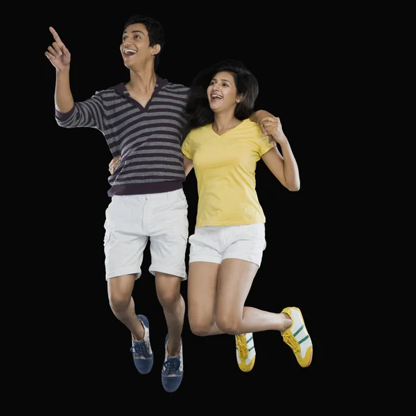 Couple jumping — Stock Photo, Image