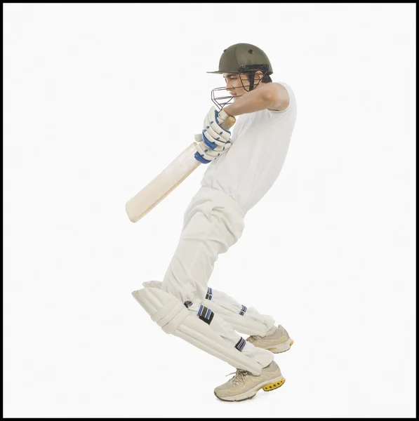 Cricket batsman playing a square cut shot — Stock Photo, Image