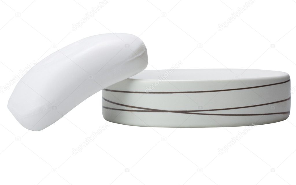 Bar of soap leaning on a soap dish